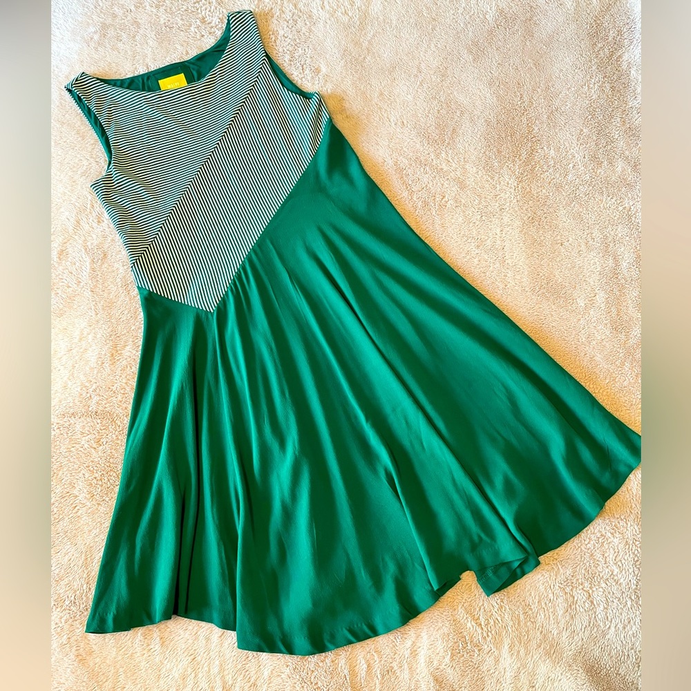 Mauve sleeveless dress. Never worn. Like new. Asymmetrical hem.